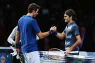 LONDON, ENGLAND - NOVEMBER 09: Roger Federer of Switzerland shakes hands with Juan Martin Del Potro of Argentina after Federer won the match during day six of the Barclays ATP World Tour Finals at O2 Arena on November 9, 2013 in London, England. (Photo by Clive Brunskill/Getty Images)