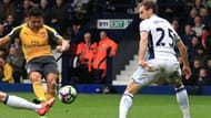 Alexis Sanchez shooting in West Brom's penalty box
