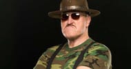 Sergeant Slaughter posing in a WWE photoshoot