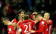 MOENCHENGLADBACH, GERMANY - MARCH 19: Thomas Mueller of Bayern Muenchen (C) celebrates the first goal with his team mates during the Bundesliga match between Borussia Moenchengladbach and Bayern Muenchen at Borussia-Park on March 19, 2017 in Moenchengladbach, Germany. (Photo by Christof Koepsel/Getty Images For MAN)