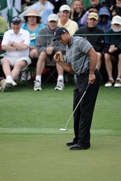 AUGUSTA, GA - APRIL 08:  Tiger Woods celebrates making birdie on the ninth hole during the first round of the 2010 Masters Tournament at Augusta National Golf Club on April 8, 2010 in Augusta, Georgia.  (Photo by Harry How/Getty Images)