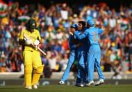 SYDNEY, AUSTRALIA - MARCH 26: Umesh Yadav of India celebrates after taking the wicket of Aaron Finch of Australia during the 2015 Cricket World Cup Semi Final match between Australia and India at Sydney Cricket Ground on March 26, 2015 in Sydney, Australia. (Photo by Ryan Pierse/Getty Images)