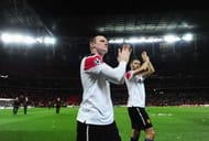 LONDON, ENGLAND - MAY 28: Wayne Rooney (L) and Ryan Giggs applaud the crowd after the UEFA Champions League final between FC Barcelona and Manchester United FC at Wembley Stadium on May 28, 2011 in London, England. (Photo by Laurence Griffiths/Getty Images)