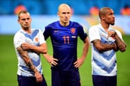 BRASILIA, DF - JULY 12: (L-R) Wesley Sneijder, Arjen Robben and Nigel de Jong of the Netherlands look on prior to the medal ceremony after defeating Brazil 3-0 in the 2014 FIFA World Cup Brazil Third Place Playoff match between Brazil and the Netherlands at Estadio Nacional on July 12, 2014 in Brasilia, Brazil. (Photo by Buda Mendes/Getty Images)