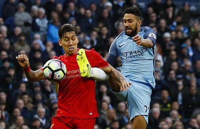 Clichy backs Wenger to continue at Arsenal