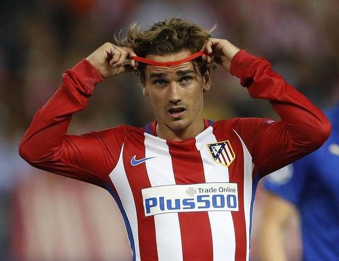 Disputed Griezmann penalty gives Atletico edge over Leicester