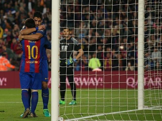 Barcelona keep pressure on Madrid with thrilling Real Sociedad win