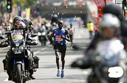 Athletics - Wanjiru holds of Bekele in London