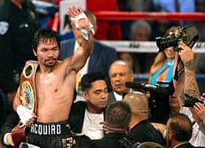 Pacquiao lands Down Under, tells Horn to be ready