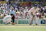 Adam Gilchrist closes in on the wickets as Kevin Petersen faces another Australian fast ball during the 3 Ashes Third Test, Second Day at the WACA Ground in Perth, Australia on December 15, 2006. (Photo by Andrew Romano/Getty Images)