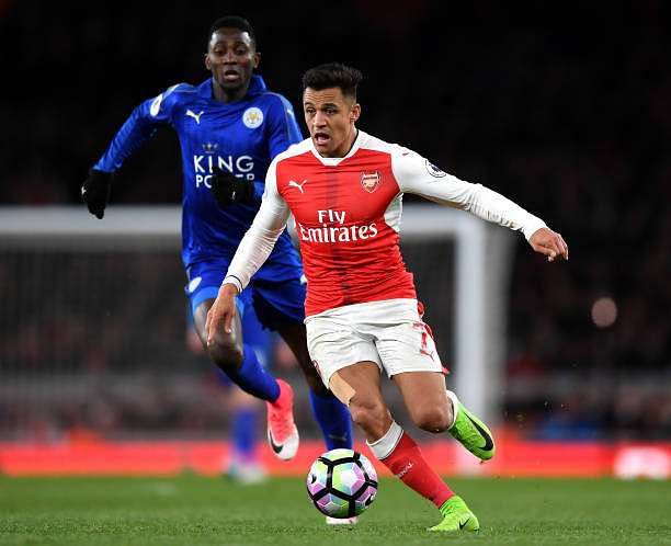 LONDON, ENGLAND - APRIL 26:  Alexis Sanchez of Arsenal is chased down by Wilfred Ndidi of Leicester City during the Premier League match between Arsenal and Leicester City at the Emirates Stadium on April 26, 2017 in London, England.  (Photo by Shaun Botterill/Getty Images)