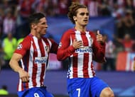 MADRID, SPAIN - APRIL 12: Antoine Griezmann of Atletico Madrid celebrates with team mate Fernando Torres after scoring the opening goal of the game during the UEFA Champions League Quarter Final first leg match between Club Atletico de Madrid and Leicester City at Vicente Calderon Stadium on April 12, 2017 in Madrid, Spain. (Photo by David Ramos/Getty Images)