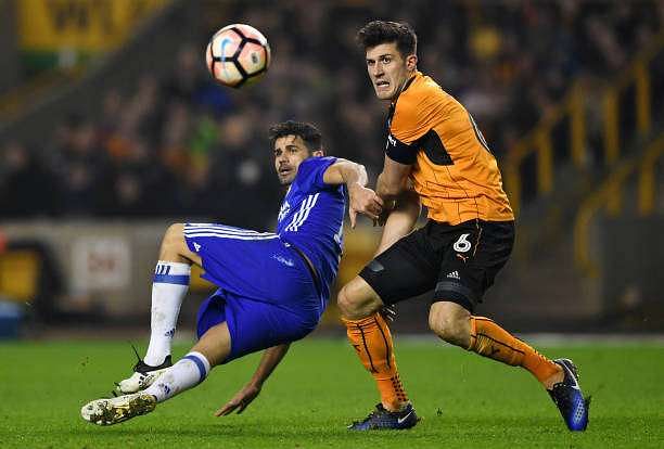 WOLVERHAMPTON, ENGLAND - FEBRUARY 18: Diego Costa of Chelsea (L) and Danny Batth of Wolves (R) battle for possession during The Emirates FA Cup Fifth Round match between Wolverhampton Wanderers and Chelsea at Molineux on February 18, 2017 in Wolverhampton, England.  (Photo by Shaun Botterill/Getty Images)