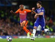LONDON, ENGLAND - APRIL 05: Fabian Delph of Manchester City (L) and Cesc Fabregas of Chelsea (R) battle for possession during the Premier League match between Chelsea and Manchester City at Stamford Bridge on April 5, 2017 in London, England. (Photo by Clive Rose/Getty Images)