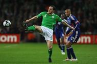 DUBLIN, IRELAND - NOVEMBER 14: France forward Thierry Henry looks on as Ireland defender John O'Shea intercepts a ball during the FIFA 2010 World Cup Qualifier play off first leg between Republic of Ireland and France at Croke Park on November 14, 2009 in Dublin, Ireland. (Photo by Stu Forster/Getty Images)