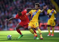 LIVERPOOL, ENGLAND - APRIL 23: Georginio Wijnaldum of Liverpool and Yohan Cabaye of Crystal Palace compete for the ball during the Premier League match between Liverpool and Crystal Palace at Anfield on April 23, 2017 in Liverpool, England. (Photo by Laurence Griffiths/Getty Images)