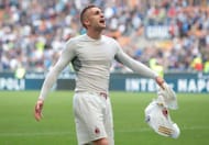 MILAN, ITALY - APRIL 15: Gerard Deulofeu of AC Milan celebrates the victory at the end of the Serie A match between FC Internazionale and AC Milan at Stadio Giuseppe Meazza on April 15, 2017 in Milan, Italy. (Photo by Emilio Andreoli/Getty Images )