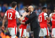 LONDON, ENGLAND - APRIL 02: Hector Bellerin of Arsenal (L) and Josep Guardiola, Manager of Manchester City (R) embrace after the Premier League match between Arsenal and Manchester City at Emirates Stadium on April 2, 2017 in London, England. (Photo by Clive Rose/Getty Images)