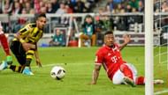 MUNICH, GERMANY - APRIL 08: Jerome Boateng of Bayern Muenchen saves a ball during the Bundesliga match between Bayern Muenchen and Borussia Dortmund at Allianz Arena on April 8, 2017 in Munich, Germany. (Photo by Alexander Scheuber/Getty Images Fuer MAN)