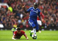 MANCHESTER, ENGLAND - APRIL 16: Jesse Lingard of Manchester United and N'Golo Kante of Chelsea battle for possession during the Premier League match between Manchester United and Chelsea at Old Trafford on April 16, 2017 in Manchester, England. (Photo by Shaun Botterill/Getty Images)