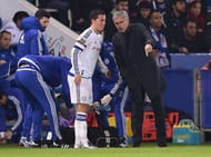 LEICESTER, ENGLAND - DECEMBER 14: Jose Mourinho the manager of Chelsea speaks with Eden Hazard of Chelsea as he receives medical treatment during the Barclays Premier League match between Leicester City and Chelsea at the King Power Stadium on December14, 2015 in Leicester, United Kingdom. (Photo by Michael Regan/Getty Images)