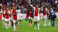 AMSTERDAM, NETHERLANDS - APRIL 02: Justin Kluivert #45 and Joel Veltman #3 of Ajax celebrate victory after the Dutch Eredivisie match between Ajax Amsterdam and Feyenoord at Amsterdam ArenA on April 2, 2017 in Amsterdam, Netherlands. (Photo by Dean Mouhtaropoulos/Getty Images)