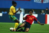 DAEJEON - JUNE 12: MacBeth Sibaya of South Africa is tackled by Miguel Angel Nadal of Spain during the Spain v South Africa, Group B, World Cup Group Stage match played at the Daejeon World Cup Stadium, Daejeon, South Korea on June 12, 2002. Spain won 3-2. (Photo by Ben Radford/Getty Images)