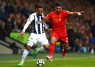 WEST BROMWICH, ENGLAND - APRIL 16: Matt Phillips of West Bromwich Albion and Emre Can of Liverpool battle for possession during the Premier League match between West Bromwich Albion and Liverpool at The Hawthorns on April 16, 2017 in West Bromwich, England. (Photo by Michael Steele/Getty Images)