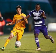 DENDERLEEUW, BELGIUM - MARCH 08: Orel Mangala of Anderlecht battles for the ball with Ferran Sarsanedas Soler of Barcelona during the UEFA Youth League Quarter-final match between Anderlecht and Barcelona held at Van Roy Stadium on March 8, 2016 in Denderleeuw, Belgium. (Photo by Dean Mouhtaropoulos/Getty Images)
