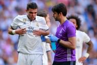 MADRID, SPAIN - APRIL 08: Pepe of Real Madrid CF grimmaces in pain after being tackled by his teammate Toni Kroos (R) during the La Liga match between Real Madrid CF and Club Atletico de Madrid at Estadio Santiago Bernabeu on April 8, 2017 in Madrid, Spain. (Photo by Gonzalo Arroyo Moreno/Getty Images)