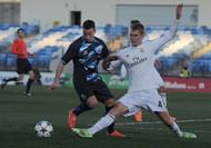 MADRID, SPAIN - FEBRUARY 17: Philipp Lienhart of Real Madrid tackles Ruben Macedo of FC Porto during the UEFA Youth League Round of 16 match between Real Madrid and FC Porto at Estadio Alfredo Di Stefano on February 17, 2015 in Madrid, Spain. (Photo by Denis Doyle/Getty Images)