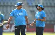 MUMBAI, INDIA - MARCH 30: Ravi Shastri, Head Coach of India speaks with Harbhajan Singh of India during an India training session at Wankhede Stadium on March 30, 2016 in Mumbai, India. (Photo by Ryan Pierse/Getty Images)