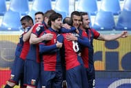 GENOA, ITALY - FEBRUARY 05: Rodrigo Palacio #8 of Genoa celebrates with team-mates after scoring the opening goal of the Serie A match between Genoa CFC and SS Lazio at Stadio Luigi Ferraris on February 5, 2012 in Genoa, Italy. (Photo by Gabriele Maltinti/Getty Images)