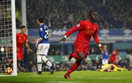 LIVERPOOL, ENGLAND - DECEMBER 19: Sadio Mane (19) of Liverpool celebrates after scoring the winning goal in injury time during the Premier League match between Everton and Liverpool at Goodison Park on December 19, 2016 in Liverpool, England. (Photo by Clive Brunskill/Getty Images)