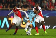 MONACO - MARCH 15: Sergio Aguero of Manchester City battles with Jemerson and Benjamin Mendy of AS Monaco during the UEFA Champions League Round of 16 second leg match between AS Monaco and Manchester City FC at Stade Louis II on March 15, 2017 in Monaco, Monaco. (Photo by Michael Steele/Getty Images)