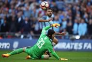 LONDON, ENGLAND - APRIL 23: Sergio Aguero of Manchester City scores the opening goal past Petr Cech of Arsenal during the Emirates FA Cup Semi-Final match between Arsenal and Manchester City at Wembley Stadium on April 23, 2017 in London, England. (Photo by Julian Finney/Getty Images,)