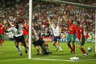 LISBON, PORTUGAL - JUNE 24: Sol Campbell of England celebrates but the the goal is disallowed during the UEFA Euro 2004 Quarter Final match between Portugal and England at the Luz Stadium on June 24, 2004 in Lisbon, Portugal. (Photo by Shaun Botterill/Getty Images)