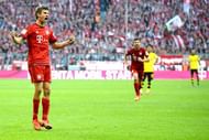 MUNICH, GERMANY - OCTOBER 04: Thomas Mueller of Muenchen celebrates after scoring his team's second goal during the Bundesliga match between FC Bayern Muenchen and Borussia Dortmund at Allianz Arena on October 4, 2015 in Munich, Germany. (Photo by Micha Will/Getty Images for MAN)