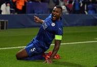 LEICESTER, ENGLAND - MARCH 14: Wes Morgan of Leicester City celebrates after scoring the opening goal during the UEFA Champions League Round of 16, second leg match between Leicester City and Sevilla FC at The King Power Stadium on March 14, 2017 in Leicester, United Kingdom. (Photo by Laurence Griffiths/Getty Images)