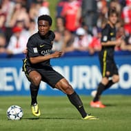 NYON, SWITZERLAND - APRIL 14: Wilfrid Kaptoum of FC Barcelona controls the ball during the UEFA Youth League Final match between Benfica Lisbon and FC Barcelona at Colovray Stadion on April 14, 2014 in Nyon, Switzerland. (Photo by Philipp Schmidli/Getty Images)