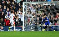 MILTON KEYNES, ENGLAND - AUGUST 26: Will Grigg of Milton Keynes Dons scores his second goal past goalkeeper David De Gea of Manchester United during the Capital One Cup Second Round match between MK Dons and Manchester United at Stadium mk on August 26, 2014 in Milton Keynes, England. (Photo by Clive Mason/Getty Images)