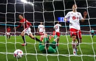 LONDON, ENGLAND - FEBRUARY 26: Zlatan Ibrahimovic of Manchester United scores their third goal past goalkeeper Fraser Forster of Southampton during the EFL Cup Final between Manchester United and Southampton at Wembley Stadium on February 26, 2017 in London, England. (Photo by Michael Steele/Getty Images)