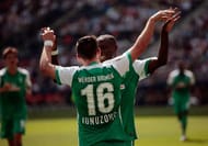 SALZBURG, AUSTRIA - JULY 11: Zlatko Junusovic (#16) of Bremen celebrates with team mate Ulisses Garcia after scoring his team's first goal during the pre-season semi final 1 match between FC Red Bull Salzburg and SV Werder Bremen as part of the Audi Quattro Cup 2015 at Red Bull Arena on July 11, 2015 in Salzburg, Austria. (Photo by Johannes Simon/Getty Images)
