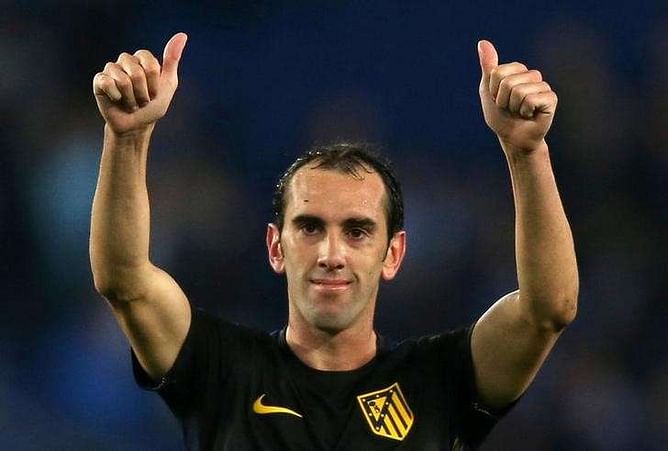 Atletico defender Godin handed three-game ban