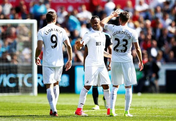 Swansea sign off by beating West Brom