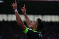 Arsenal's Chilean striker Alexis Sanchez celebrates after scoring their third goal during the English Premier League football match between Stoke City and Arsenal at the Bet365 Stadium in Stoke-on-Trent, central England on May 13, 2017.Arsenal won the game 4-1. / AFP PHOTO / Lindsey PARNABY / RESTRICTED TO EDITORIAL USE. No use with unauthorized audio, video, data, fixture lists, club/league logos or 'live' services. Online in-match use limited to 75 images, no video emulation. No use in betting, games or single club/league/player publications. / (Photo credit should read LINDSEY PARNABY/AFP/Getty Images)