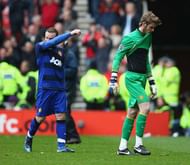 SUNDERLAND, ENGLAND - MAY 13: David De Gea and Wayne Rooney of Manchester United leave the field after the Barclays Premier League match between Sunderland and Manchester United at Stadium of Light on May 13, 2012 in Sunderland, England. (Photo by Clive Mason/Getty Images)