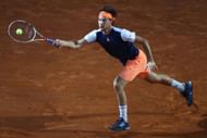 ROME, ITALY - MAY 20: Dominic Thiem of Austria in action during the men's semi-final against Novak Djokovic of Serbia on Day Seven of the Internazionali BNL d'Italia 2017 at Foro Italico on May 20, 2017 in Rome, Italy. (Photo by Michael Steele/Getty Images)