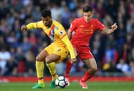 LIVERPOOL, ENGLAND - APRIL 23: Fraizer Campbell of Crystal Palace and Philippe Coutinho of Liverpool compete for the ball during the Premier League match between Liverpool and Crystal Palace at Anfield on April 23, 2017 in Liverpool, England. (Photo by Laurence Griffiths/Getty Images)