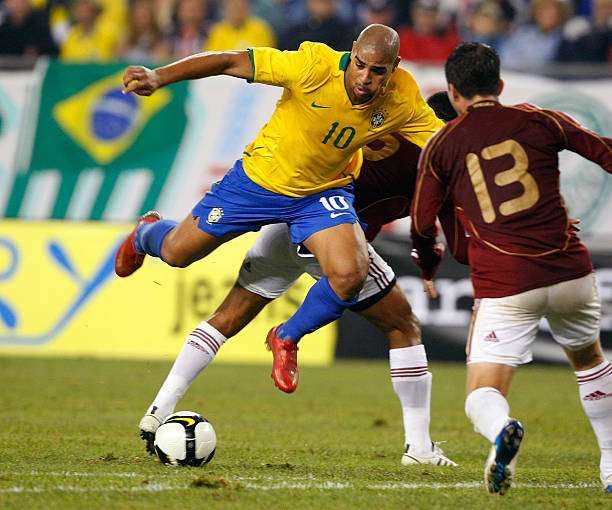 FOXBORO, MA - JUNE 6: Gerzon Chacon #13 of Venezuela battles Adriano #10 of Brazil during a friendly exhibition soccer match at Gillette Stadium on June 6, 2008, in Foxboro, Massachusetts. (Photo by Jim Rogash/Getty Images) ***Gerzon Chacon, Adriano